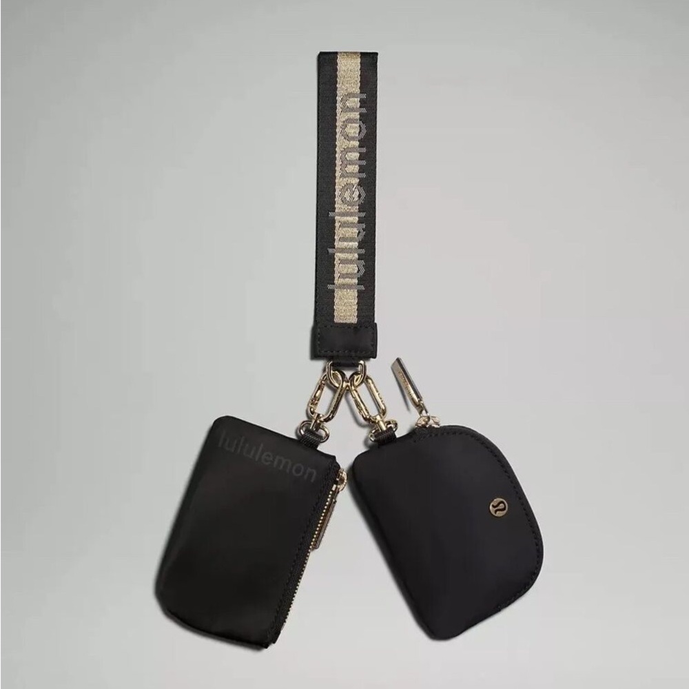 - Lululemon Black & Gold dual keychain